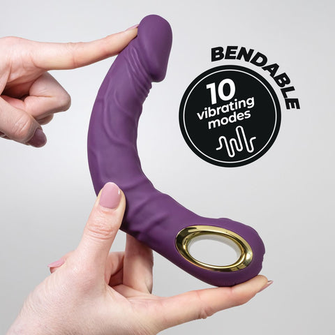 Vibrador Realistico Magnus Roxo 22.5cm Ø3.6cm, ideal para proporcionar sensações únicas com 10 modos de vibração.
